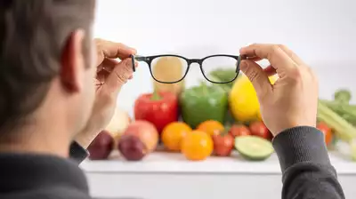 User experiencing color blindness while looking at colorful objects